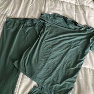 Two piece matching set. 92% polyester. 8% spandex. Very soft and stretchy